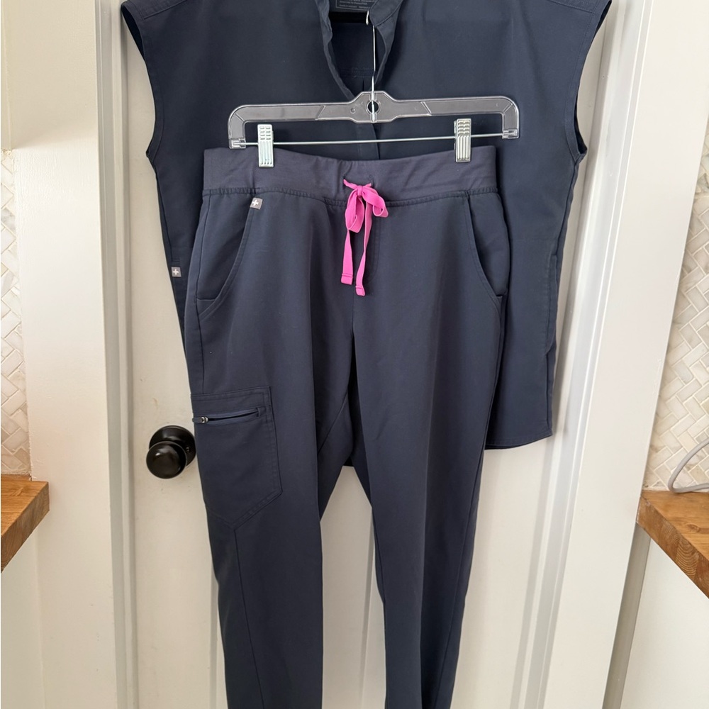 Figs navy and graphite scrub sets . Like new$100 for both sets